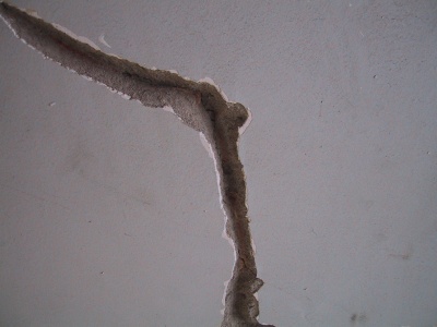 A crack in plaster raked out